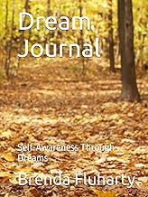 Cover of a dream journal titled "Dream Journal" by Brenda Fluharty, featuring a serene pathway covered in autumn leaves.